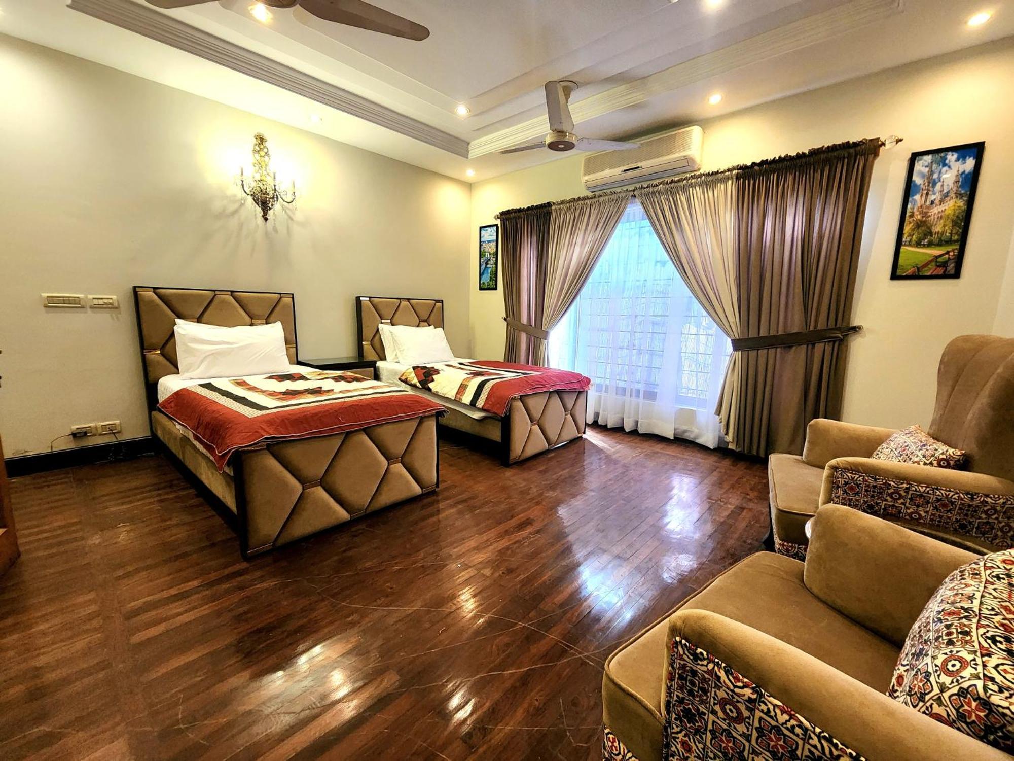 The Millenial Apartments & Suites Bahria Town 라왈핀디 객실 사진