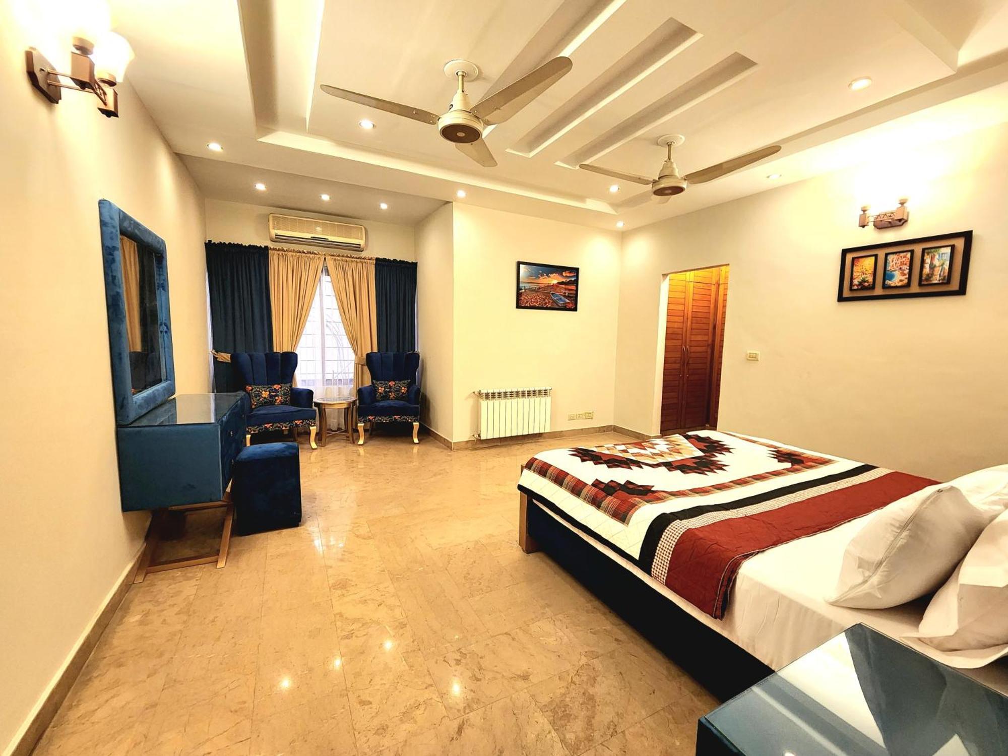 The Millenial Apartments & Suites Bahria Town 라왈핀디 객실 사진