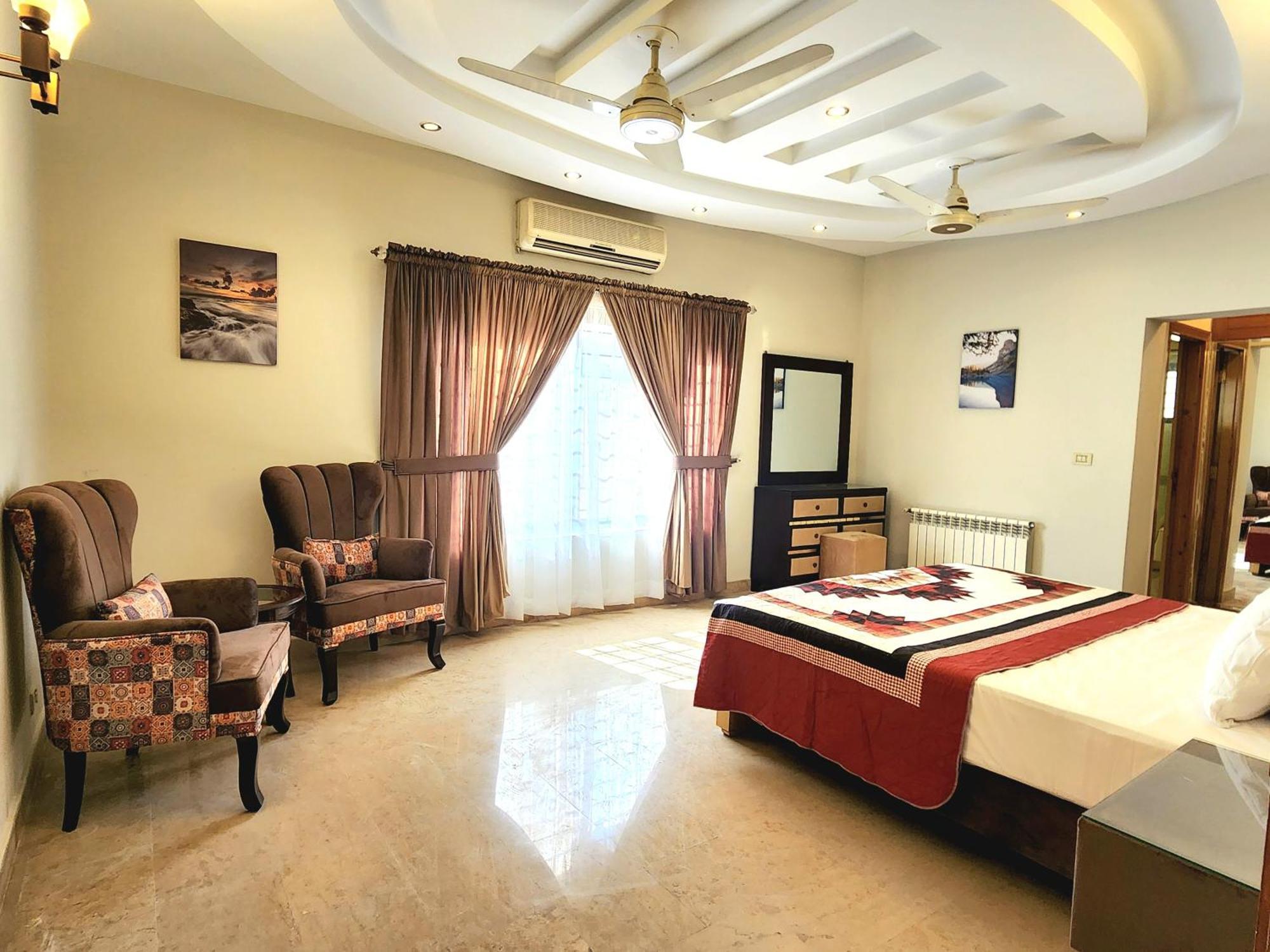 The Millenial Apartments & Suites Bahria Town 라왈핀디 객실 사진
