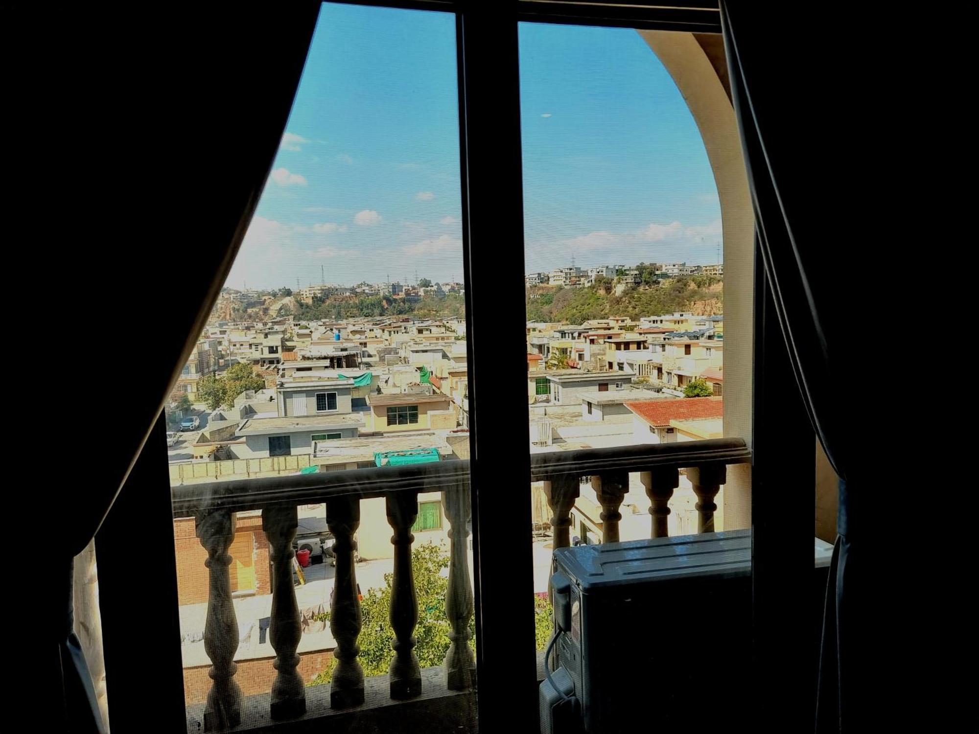 The Millenial Apartments & Suites Bahria Town 라왈핀디 객실 사진