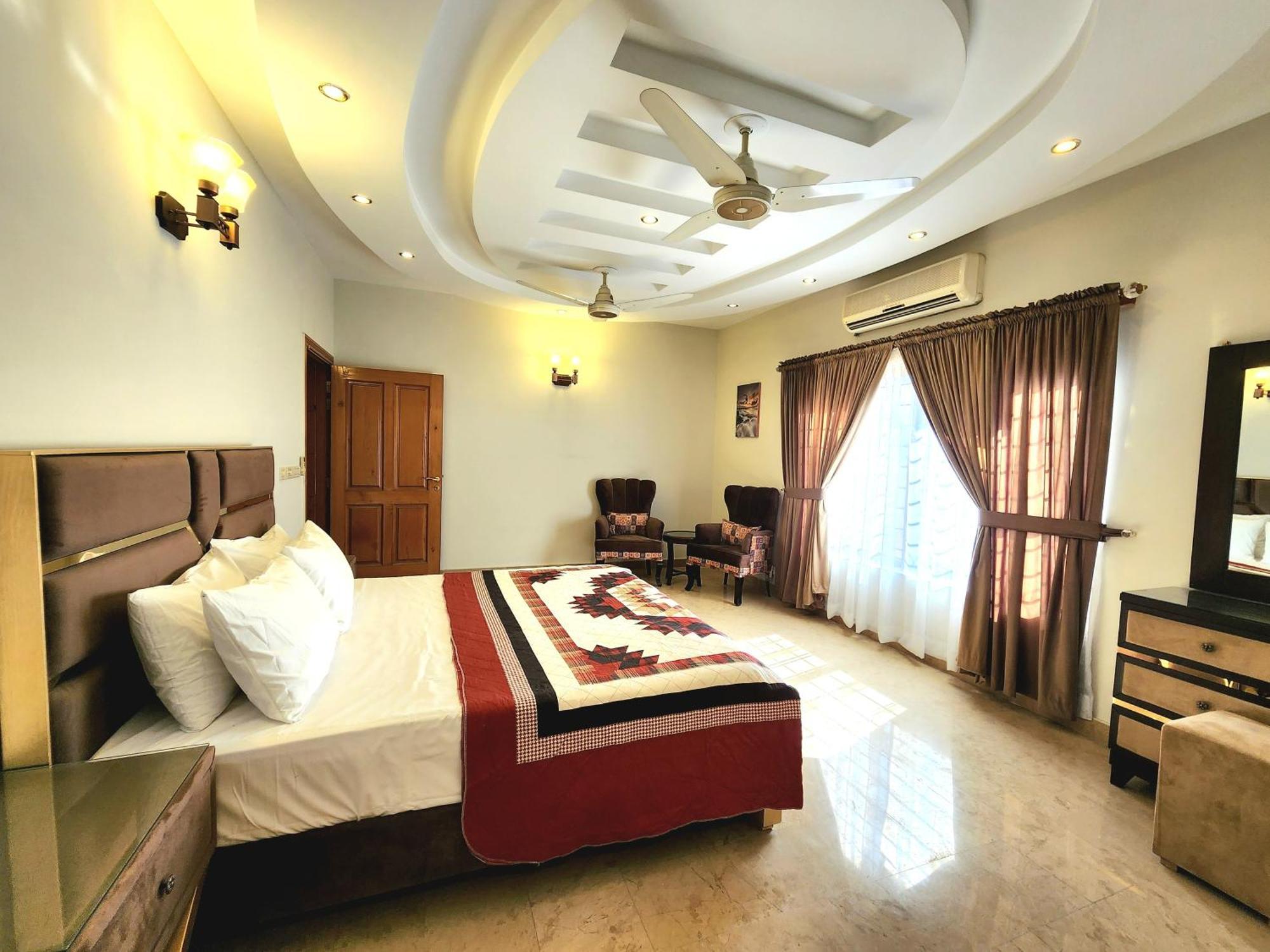 The Millenial Apartments & Suites Bahria Town 라왈핀디 객실 사진