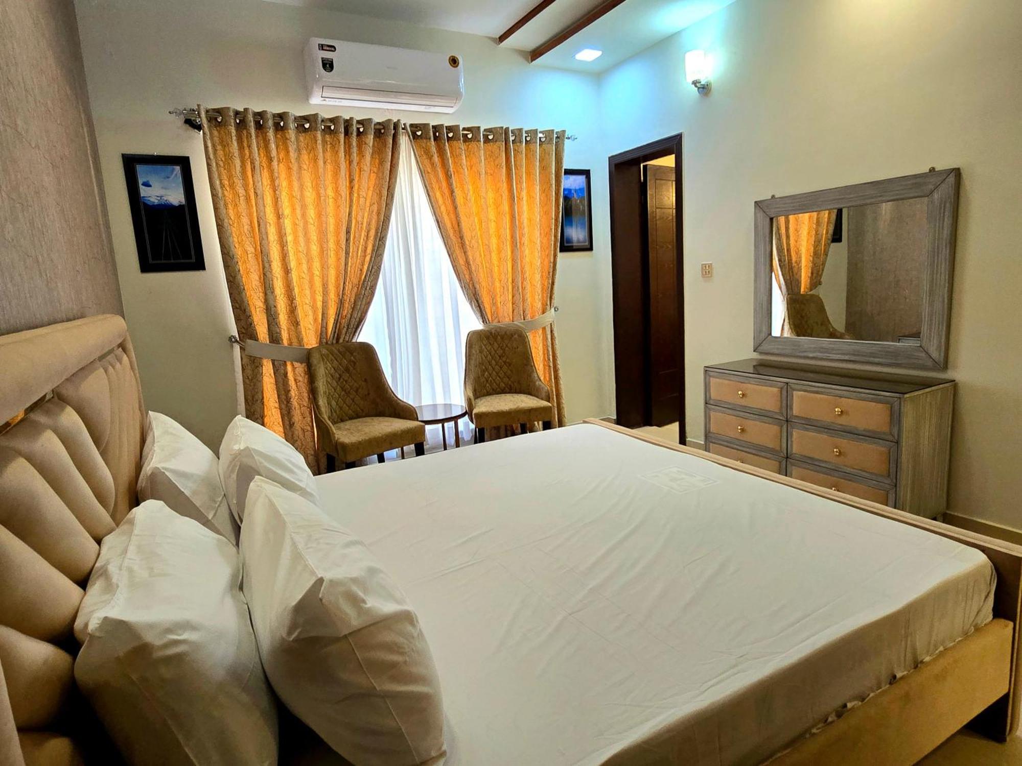 The Millenial Apartments & Suites Bahria Town 라왈핀디 객실 사진