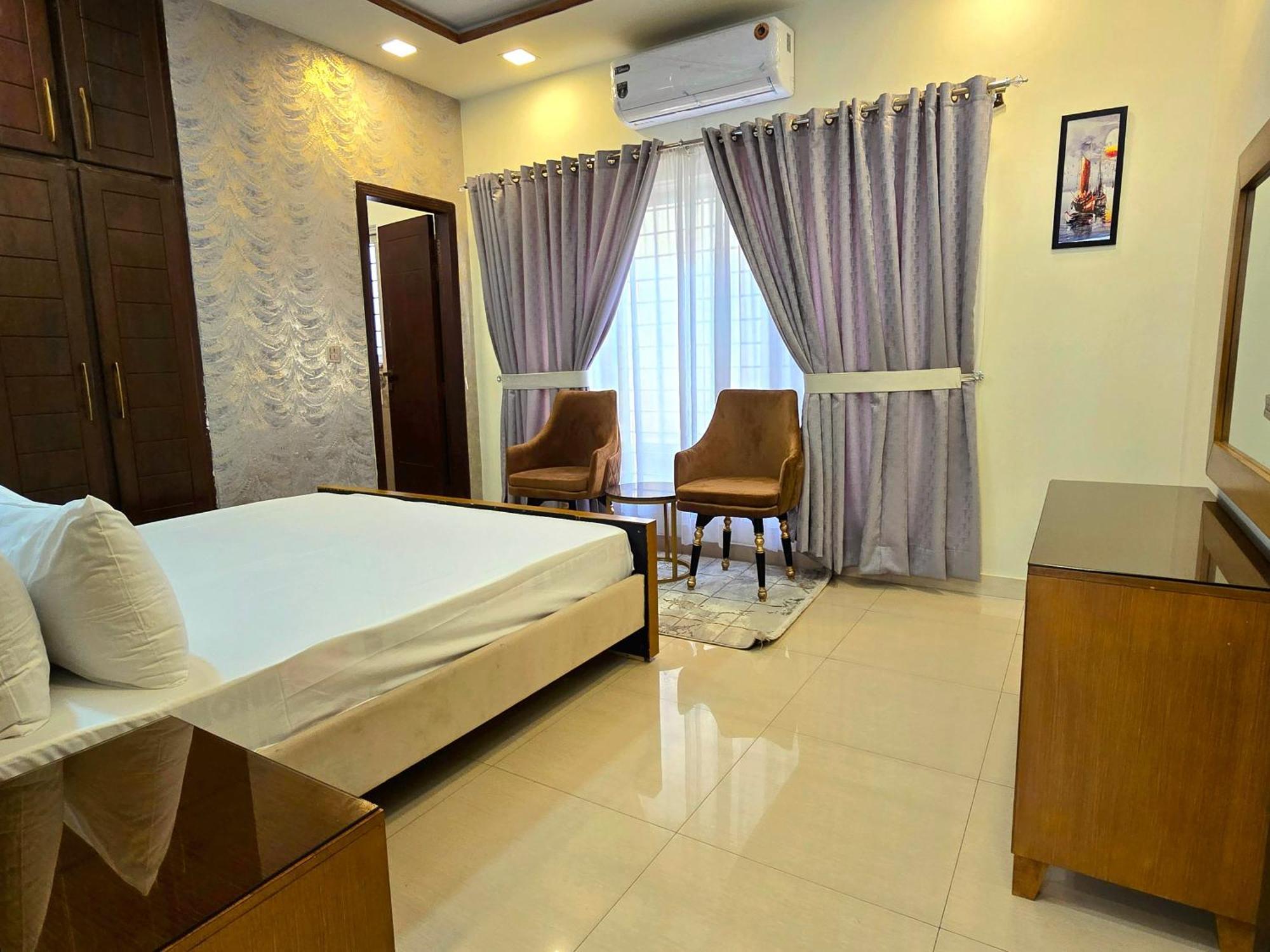 The Millenial Apartments & Suites Bahria Town 라왈핀디 객실 사진